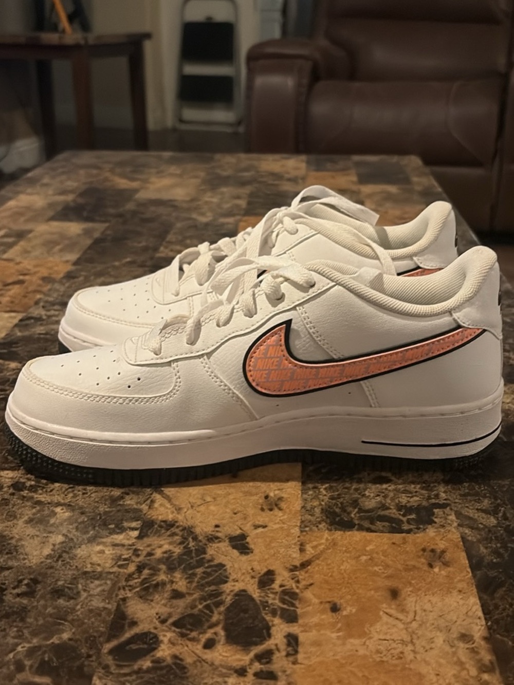 Nike White Low-Top Sneakers with Coral Swoosh